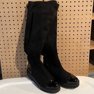 Knee high lug sole boots